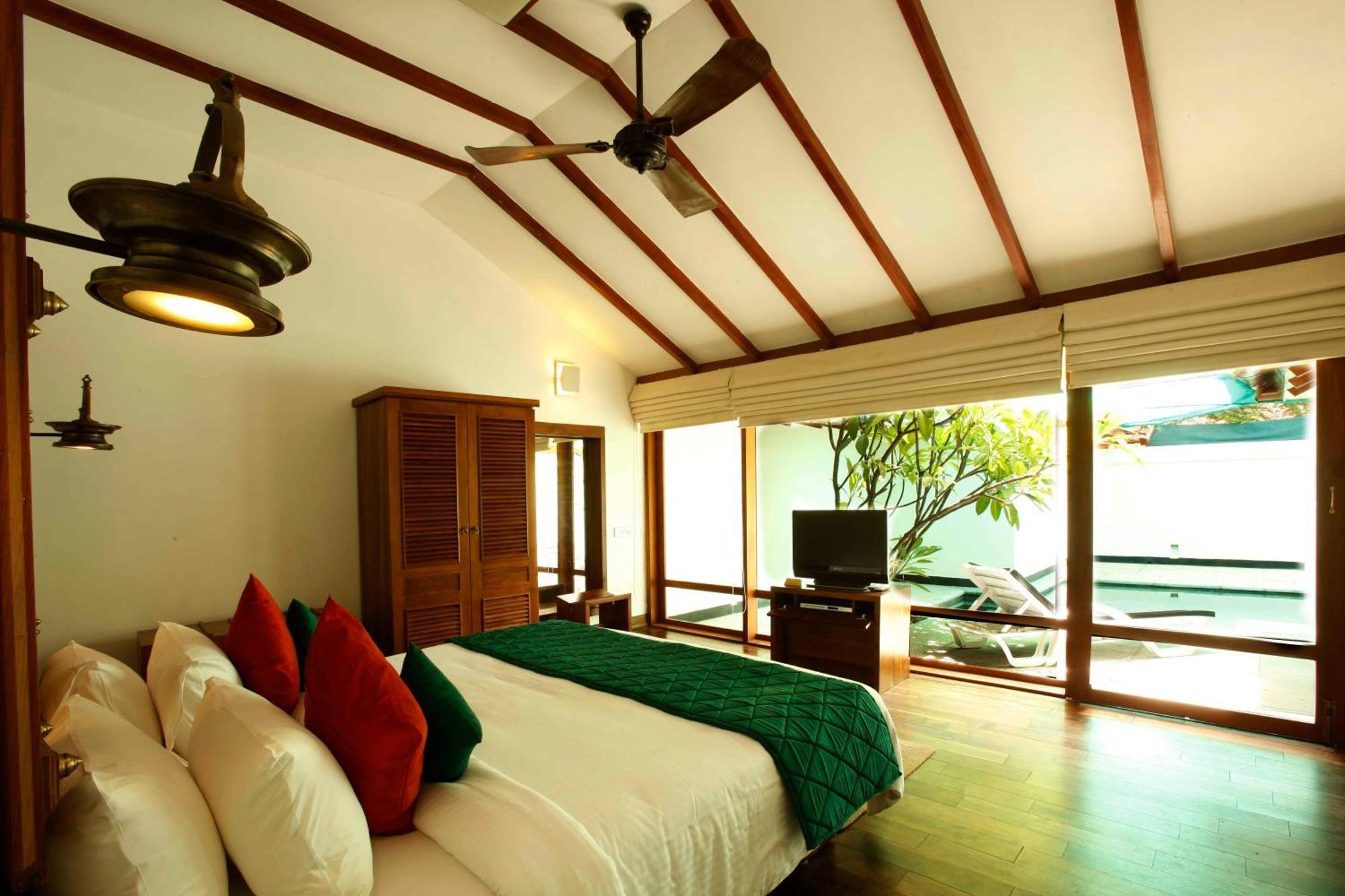 فندق ذا هرتيدج مادوراي الغرفة الصورة A bedroom at the resort