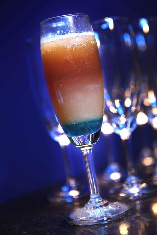 فندق ذا هرتيدج مادوراي المظهر الخارجي الصورة A layered cocktail