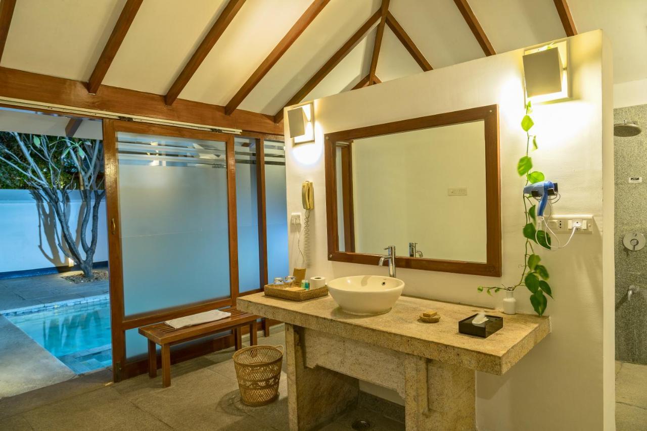 فندق ذا هرتيدج مادوراي المظهر الخارجي الصورة Bathroom of a beach villa