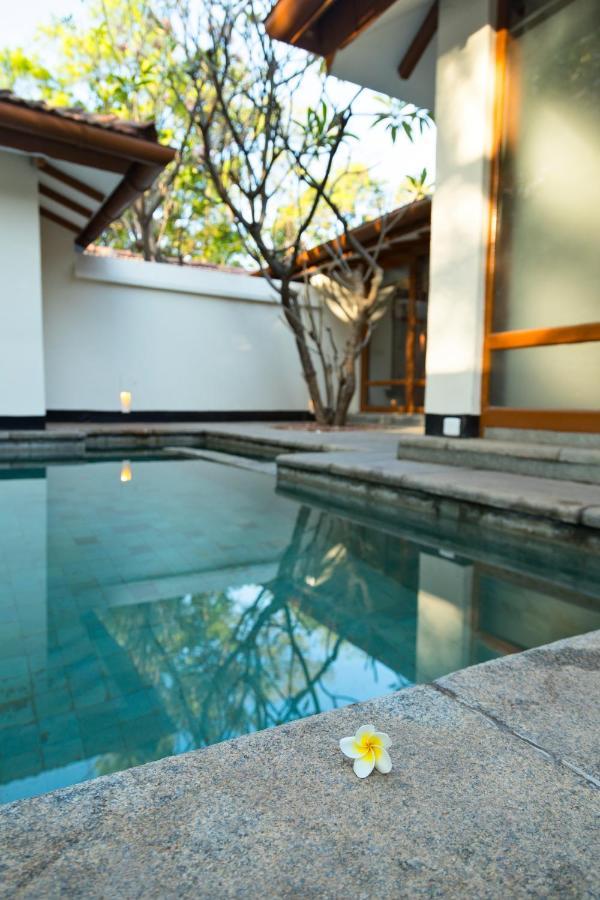 فندق ذا هرتيدج مادوراي المظهر الخارجي الصورة A swimming pool at a private residence in Bangalore, India